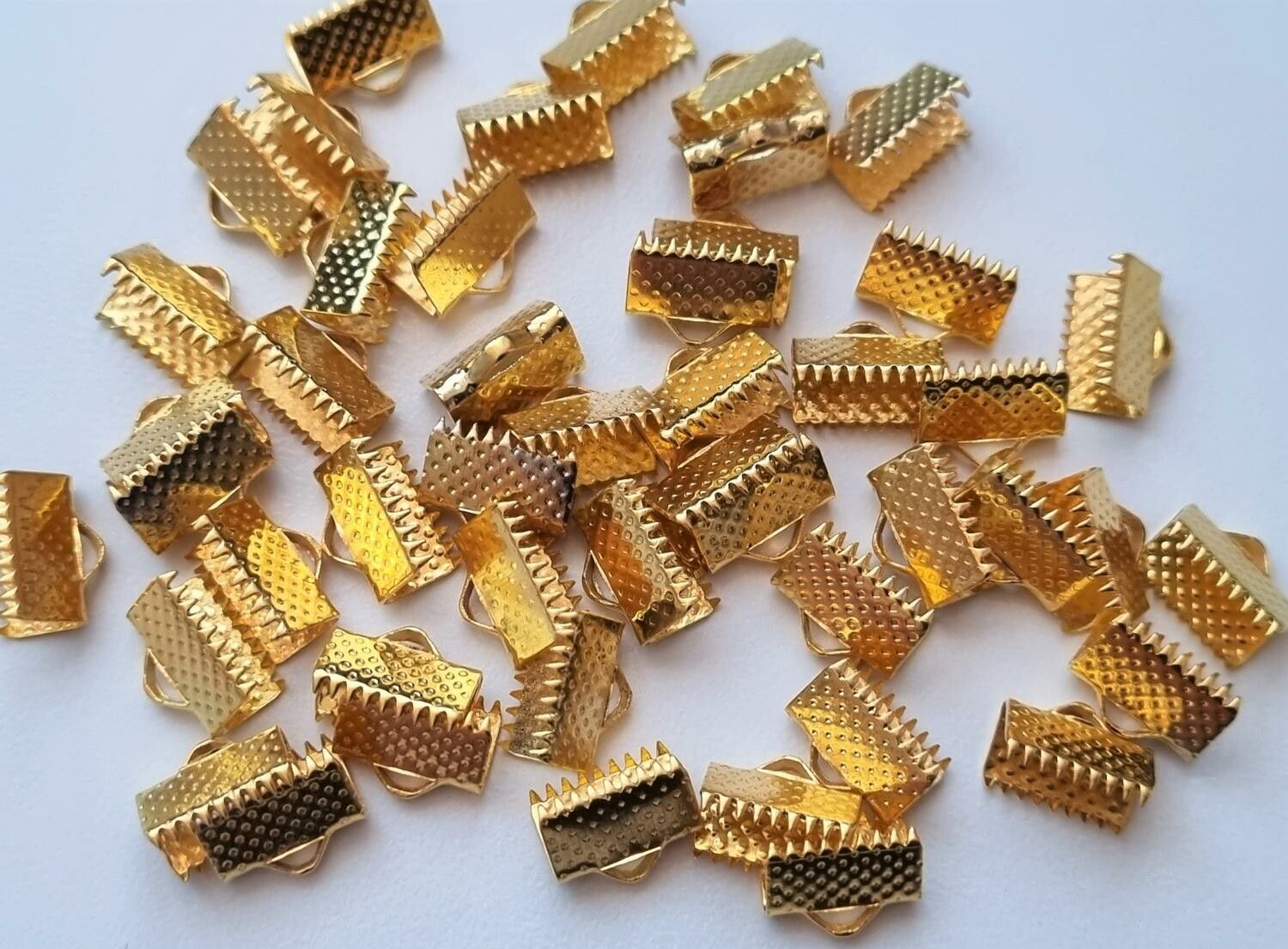 10 st guldfärgade lås klämmor (10 mm)