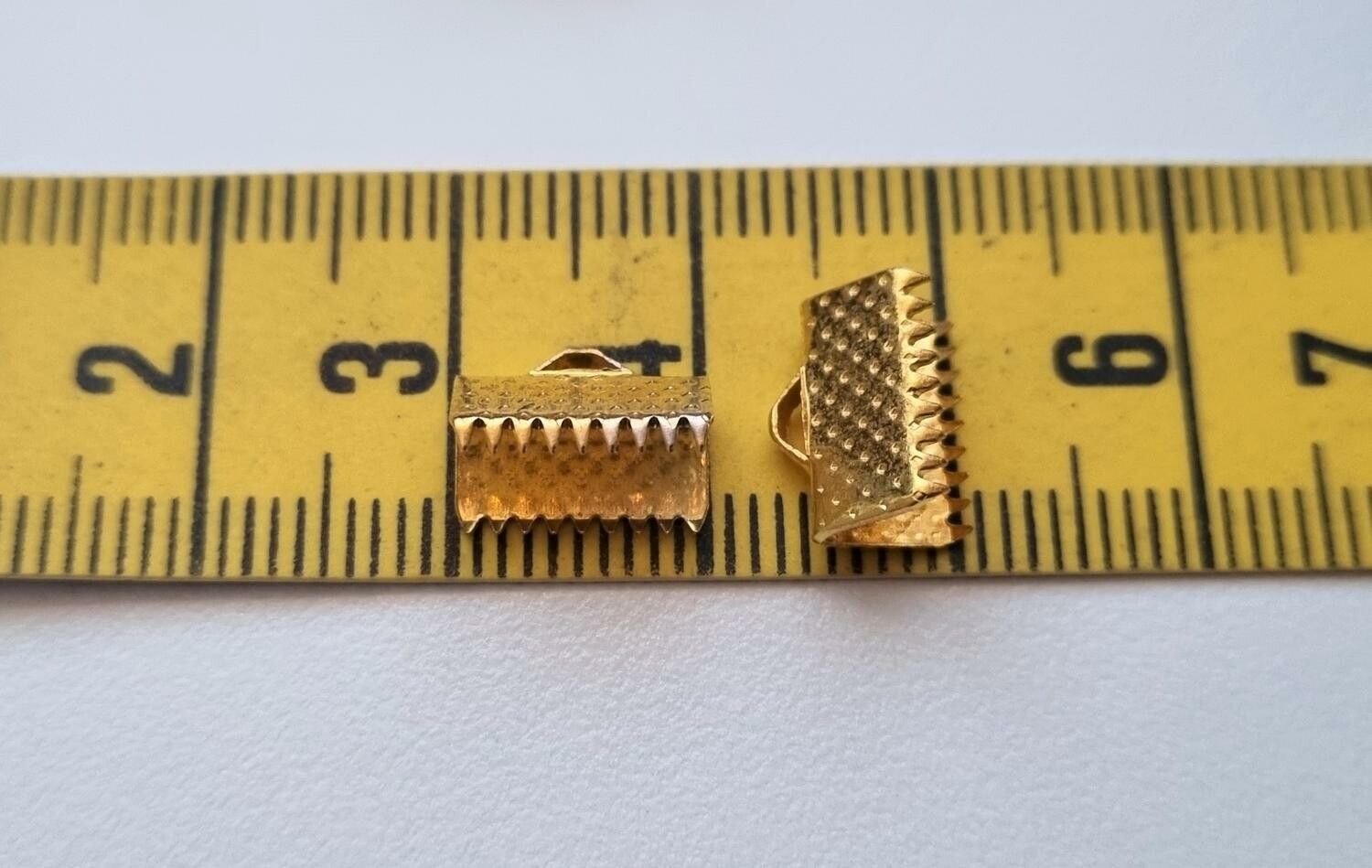 10 st guldfärgade lås klämmor (10 mm)