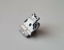 Pin, Katt som sitter i en låda