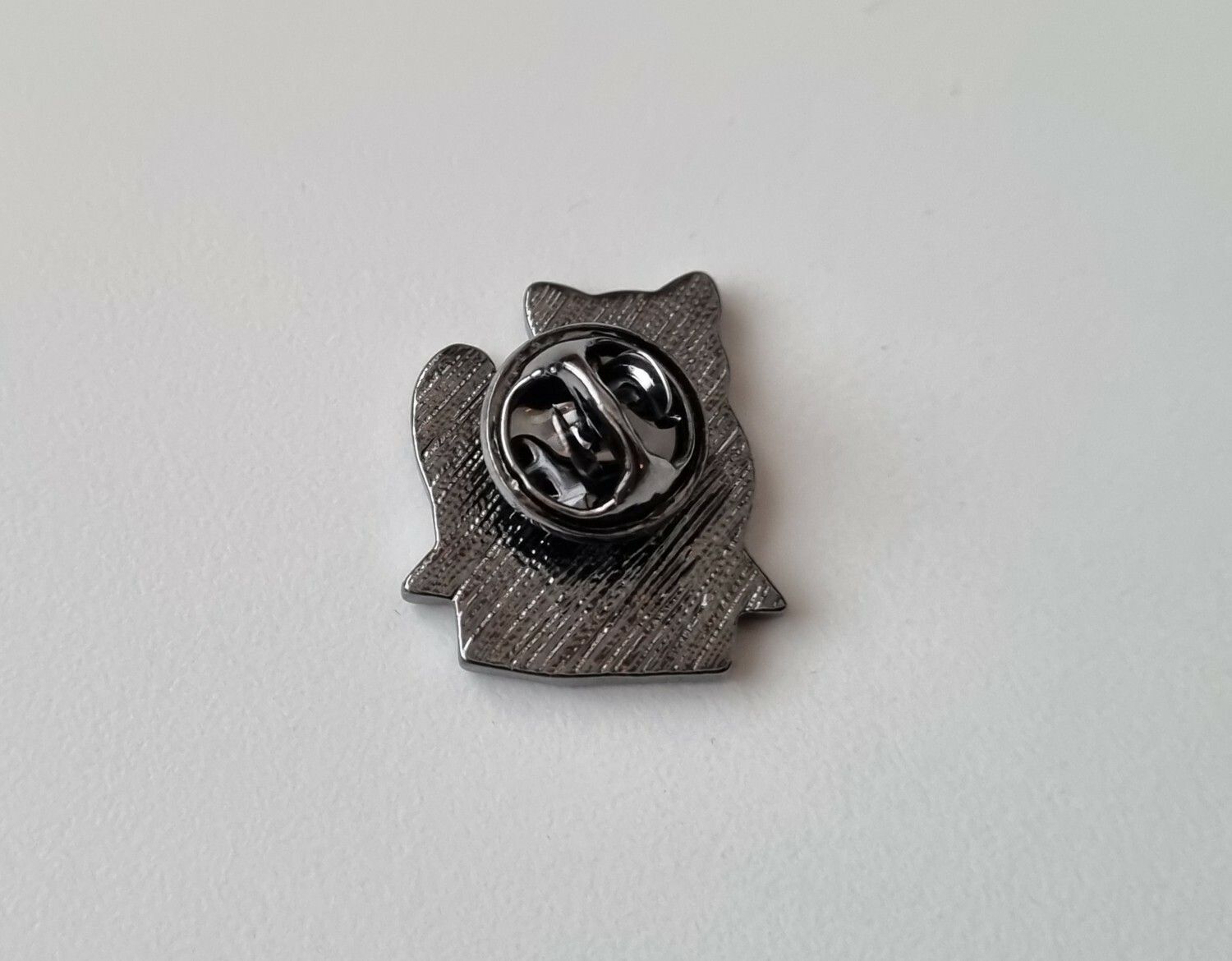 Pin, Katt som sitter i en låda