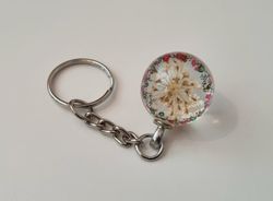 Nyckelring Glaskula glasboll med torkad blomma (Vit/gul)