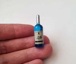 1 st miniatyr, vinflaska till dockskåp, tittskåp (blå)