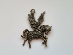 1 st detaljerad enhörning. Berlocker / hänge / charm (bronsfärgad)