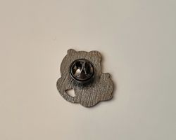 Pin, gullig liten apa med en klase bananer