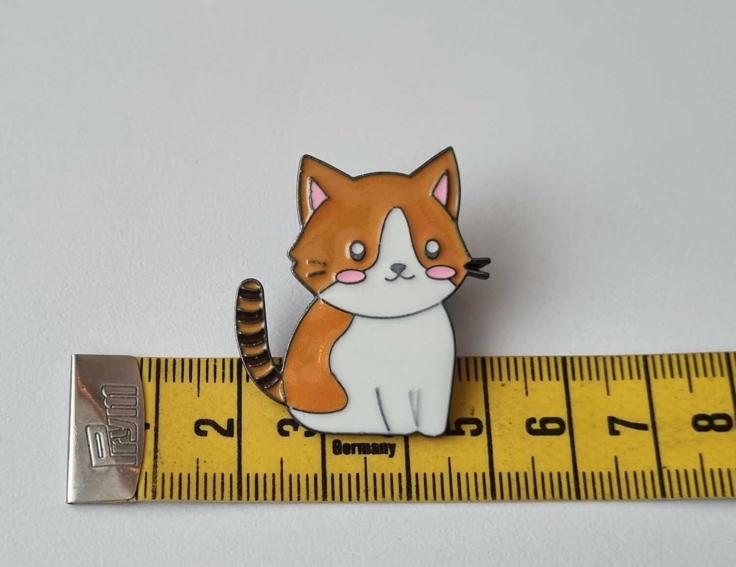 Pin, gullig katt