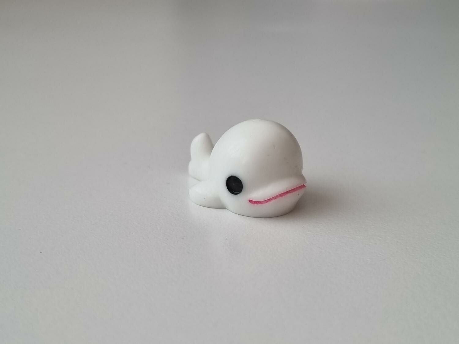 Vit liten val, minival / miniatyr