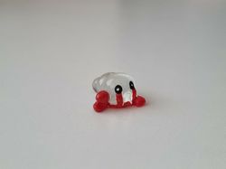 Ledset litet sagoväsen / miniatyr
