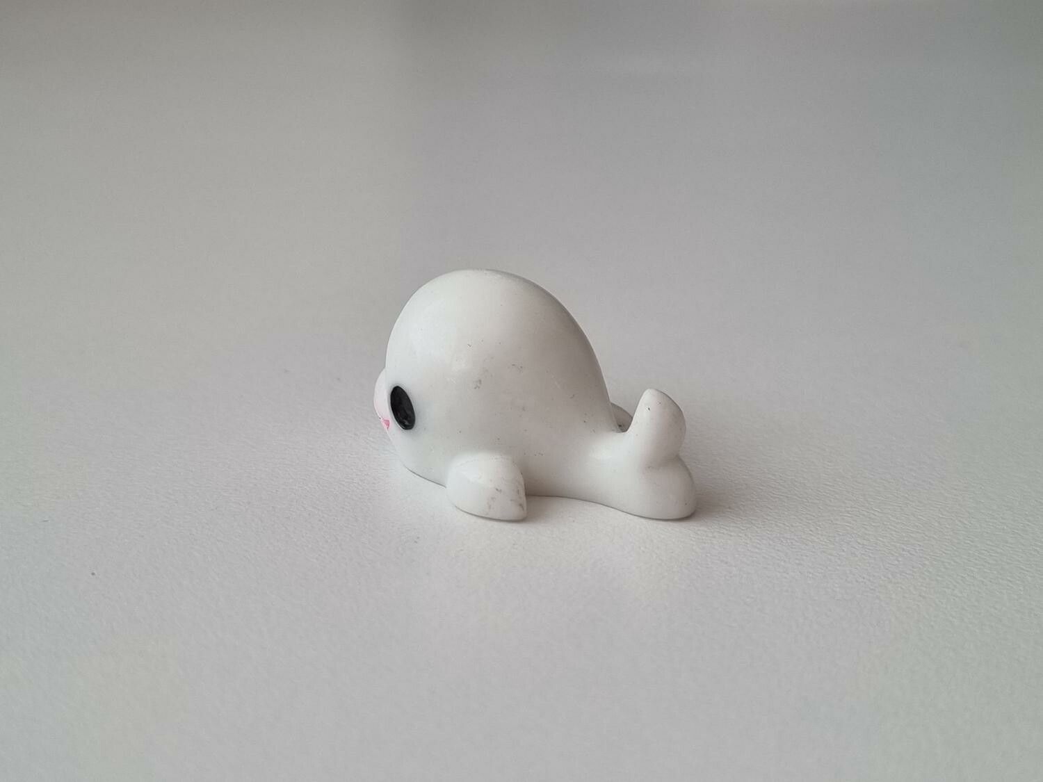 Vit liten val, minival / miniatyr