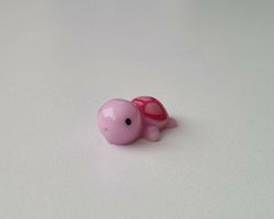 Söt liten lila sköldpadda, minisköldpadda / miniatyr