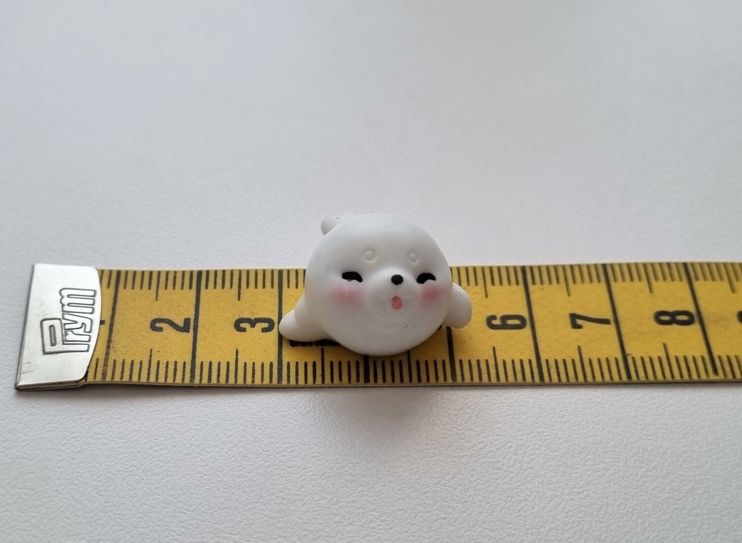Gullig liten vit säl, miniatyr