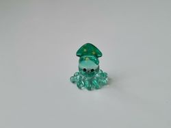 Gullig liten bläckfisk, miniatyr