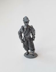 Detaljerad liten figur i tenn / musketör i tenn / miniatyr