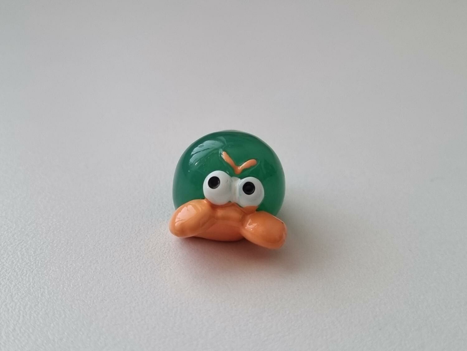 Handmålad liten arg erimitkräfta, miniatyr
