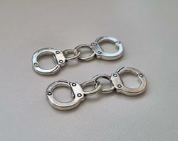2 st berlocker, charms - Handbojor