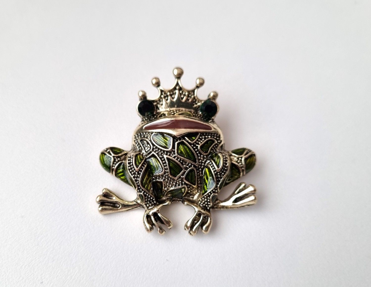 Brosch Groda med kungakrona