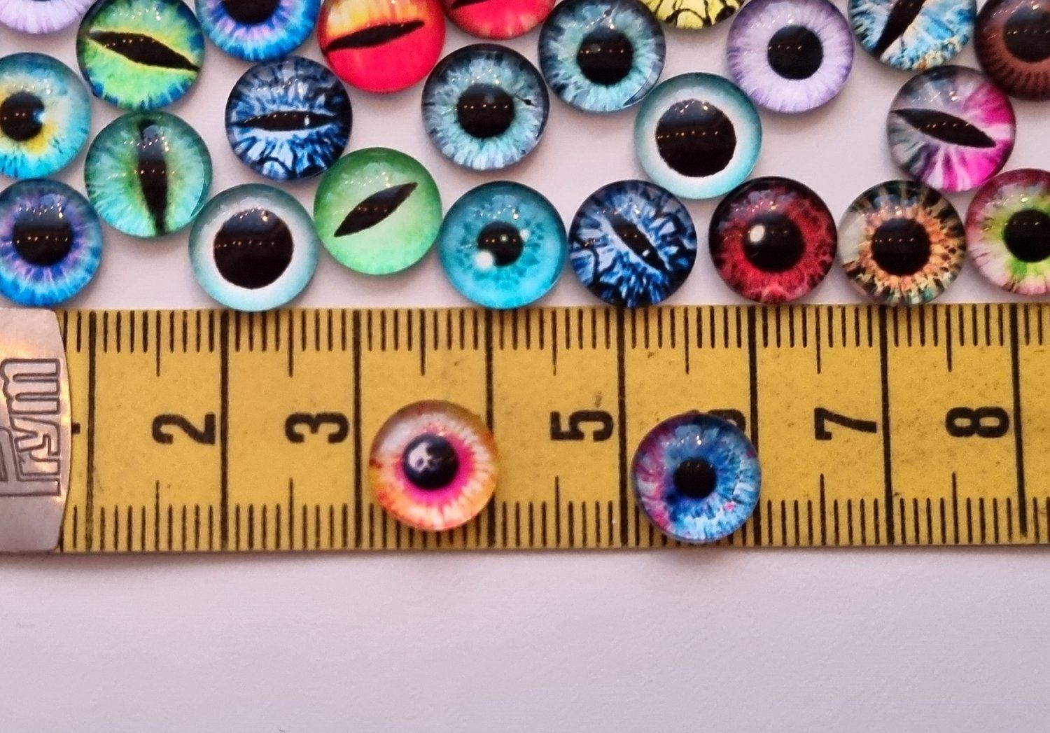 100 st drakögon kattögon i glas, glasinfattningar, miniatyrer (10 mm)