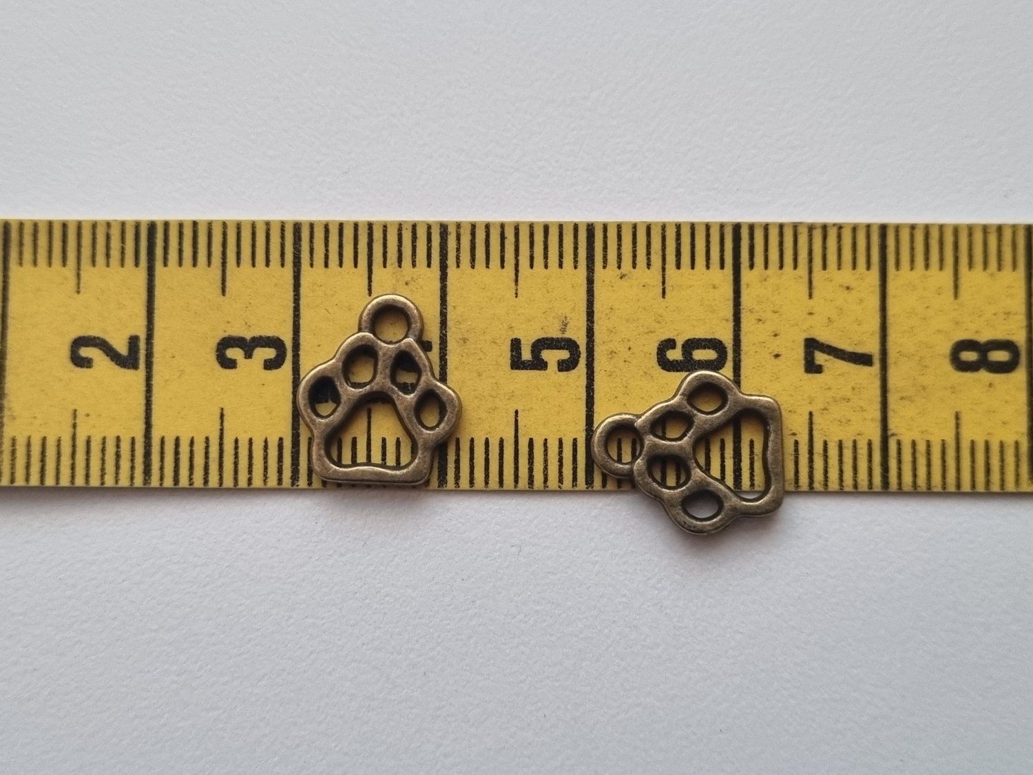 Berlocker Hundtassar (2 st bronsfärgade)