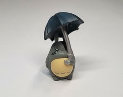 1 st liten sagofigur med paraply, miniatyr