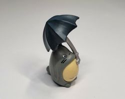 1 st liten sagofigur med paraply, miniatyr