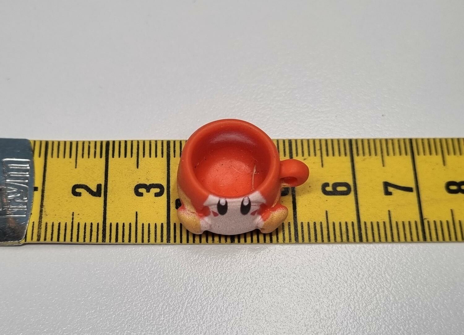 1 st liten sagofigur / kopp, miniatyr