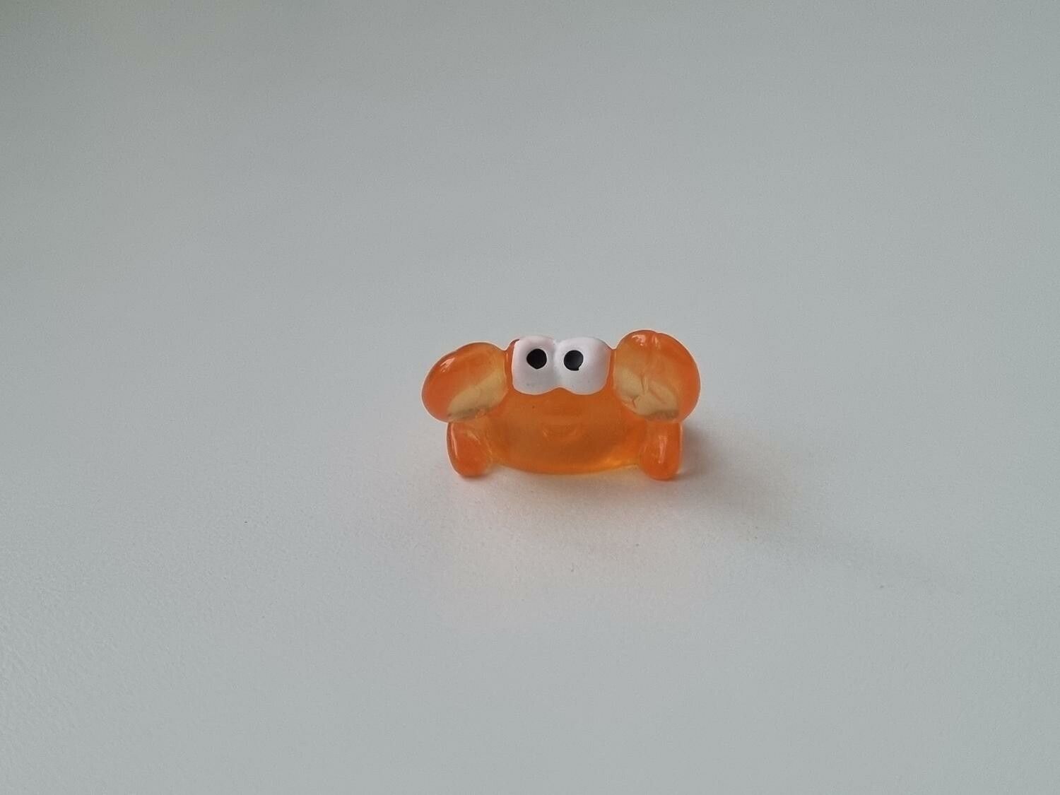 Gullig liten orange krabba, miniatyr