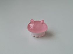 Gullig liten rosa sagofigur, miniatyr