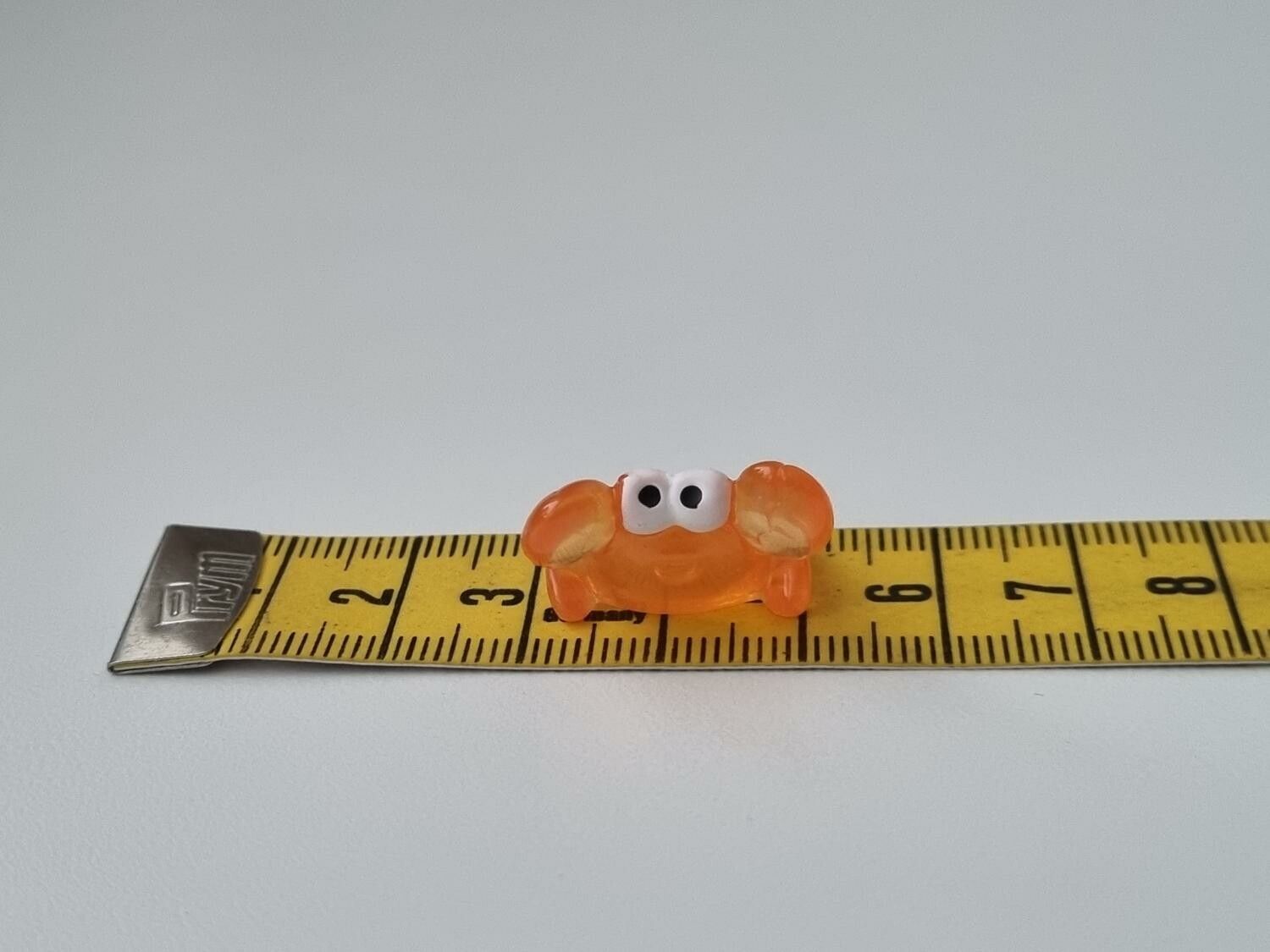 Gullig liten orange krabba, miniatyr