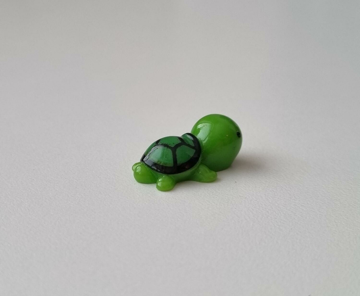 Söt liten grön sköldpadda, minisköldpadda / miniatyr