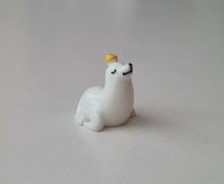 Nöjd liten säl, minisäl / miniatyr