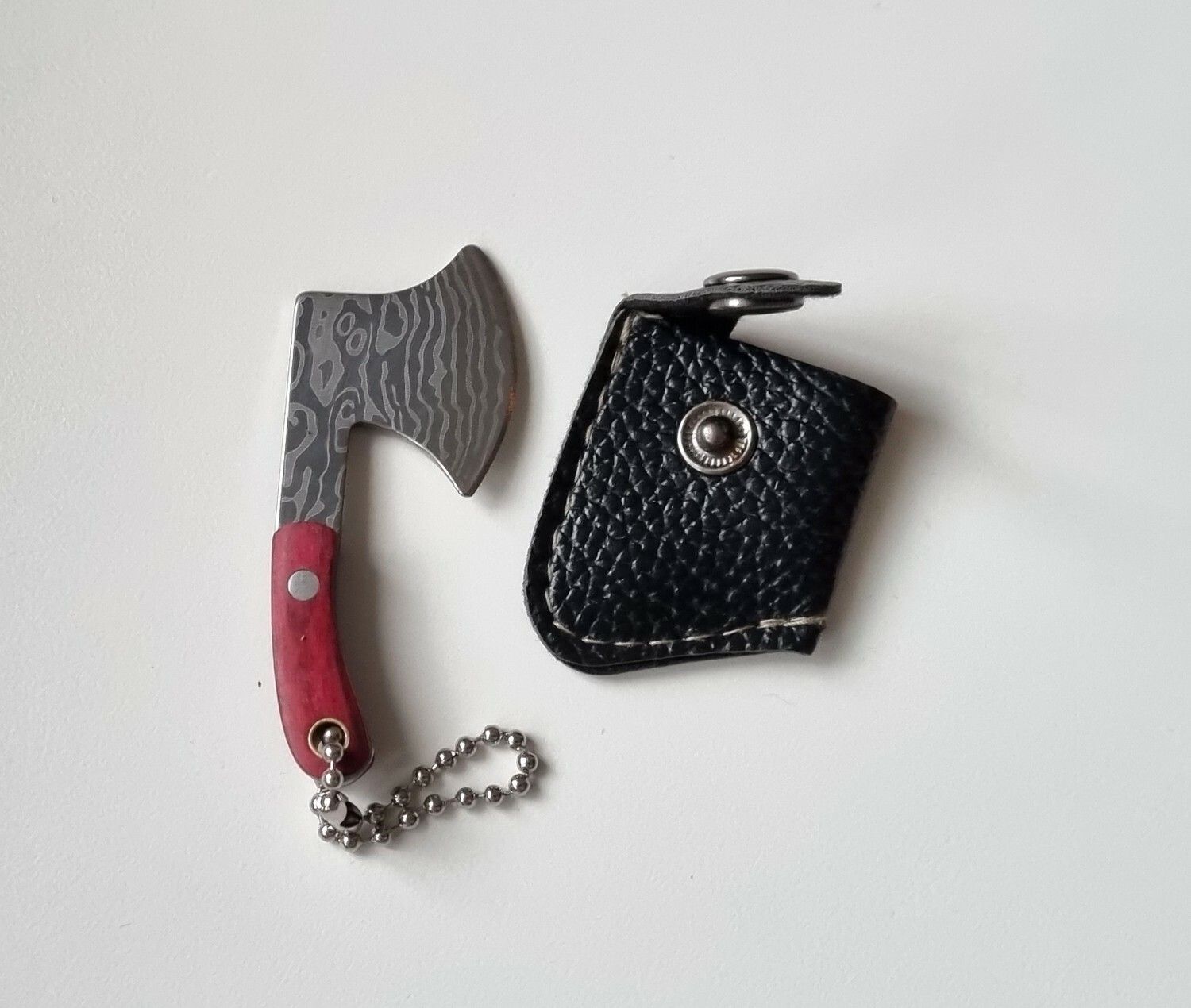 Gullig liten miniatyryxa / miniyxa med fodral
