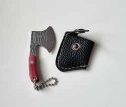 Gullig liten miniatyryxa / miniyxa med fodral