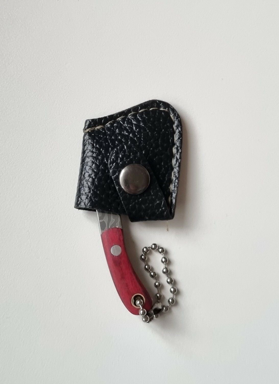 Gullig liten miniatyryxa / miniyxa med fodral