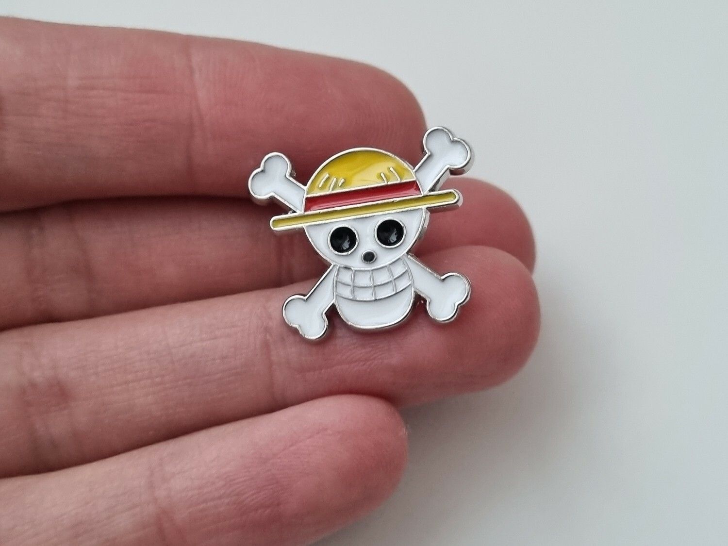 Pin, söt liten dödskalle