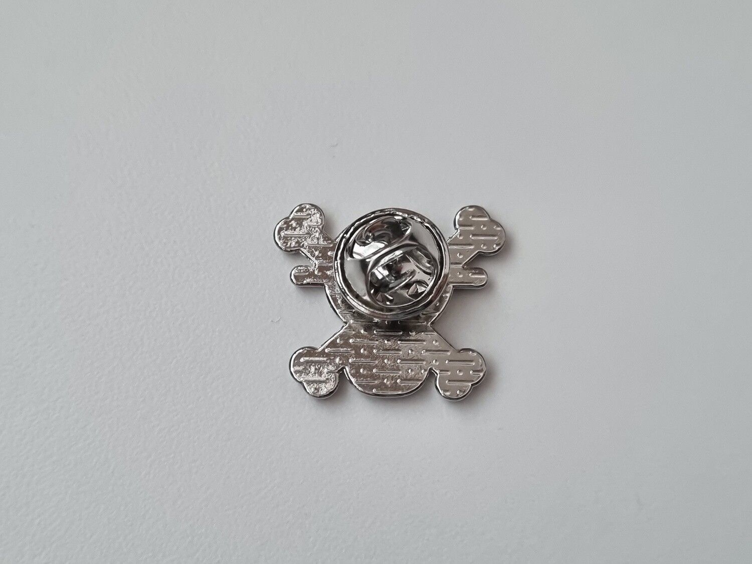 Pin, söt liten dödskalle