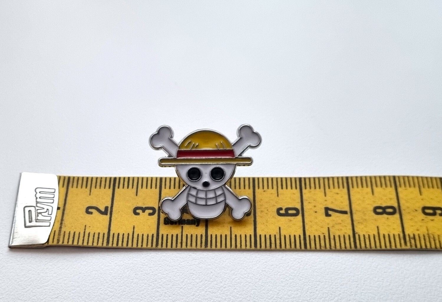 Pin, söt liten dödskalle