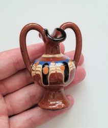 1 st kruka med öron i porslin (6,9 cm hög)