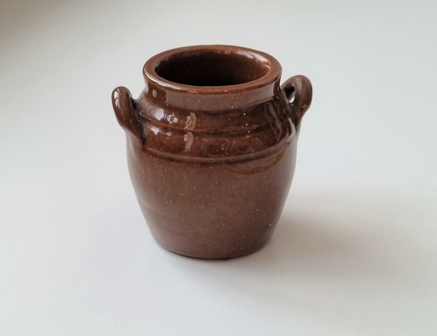 1 st kruka med öron i porslin (64 gram, 4,9 cm hög)