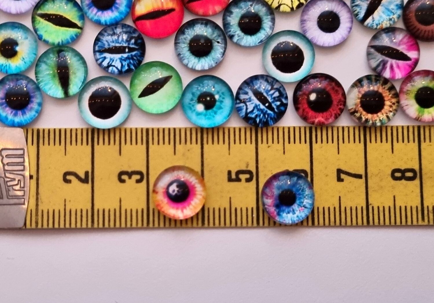 100 st drakögon kattögon i glas, glasinfattningar, miniatyrer (10 mm)