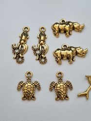12 st guldfärgade Berlocker Charms Hängen för smyckestillverkning (par)