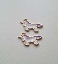 2 st lila enhörningar - berlocker / charms / hängen