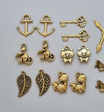 20 st guldfärgade Berlocker Charms Hängen för smyckestillverkning (par)