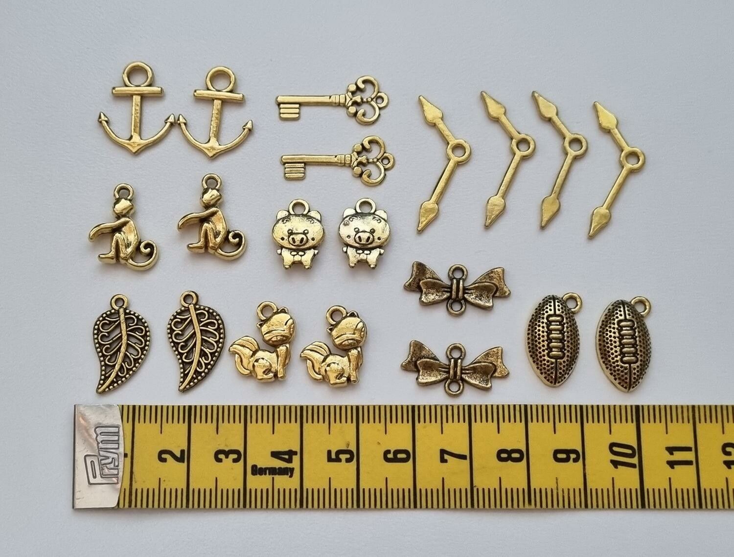 20 st guldfärgade Berlocker Charms Hängen för smyckestillverkning (par)
