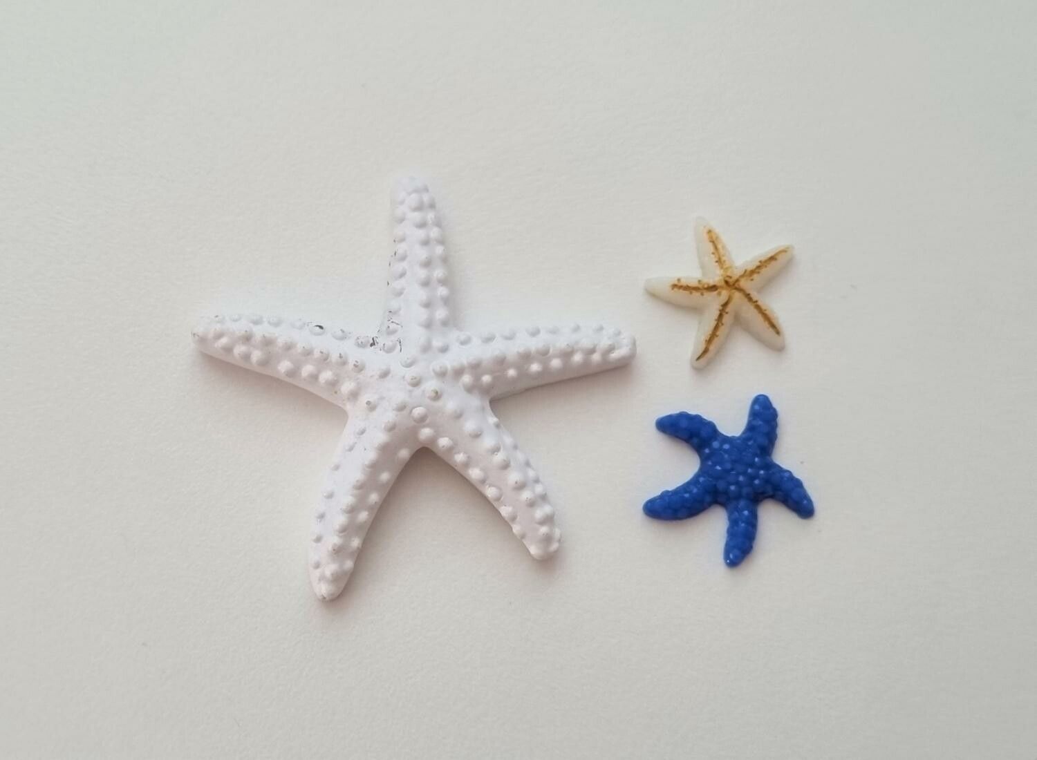 3 st sjöstjärnor. Miniatyrer / figuriner för dockskåpet, tittskåp mm