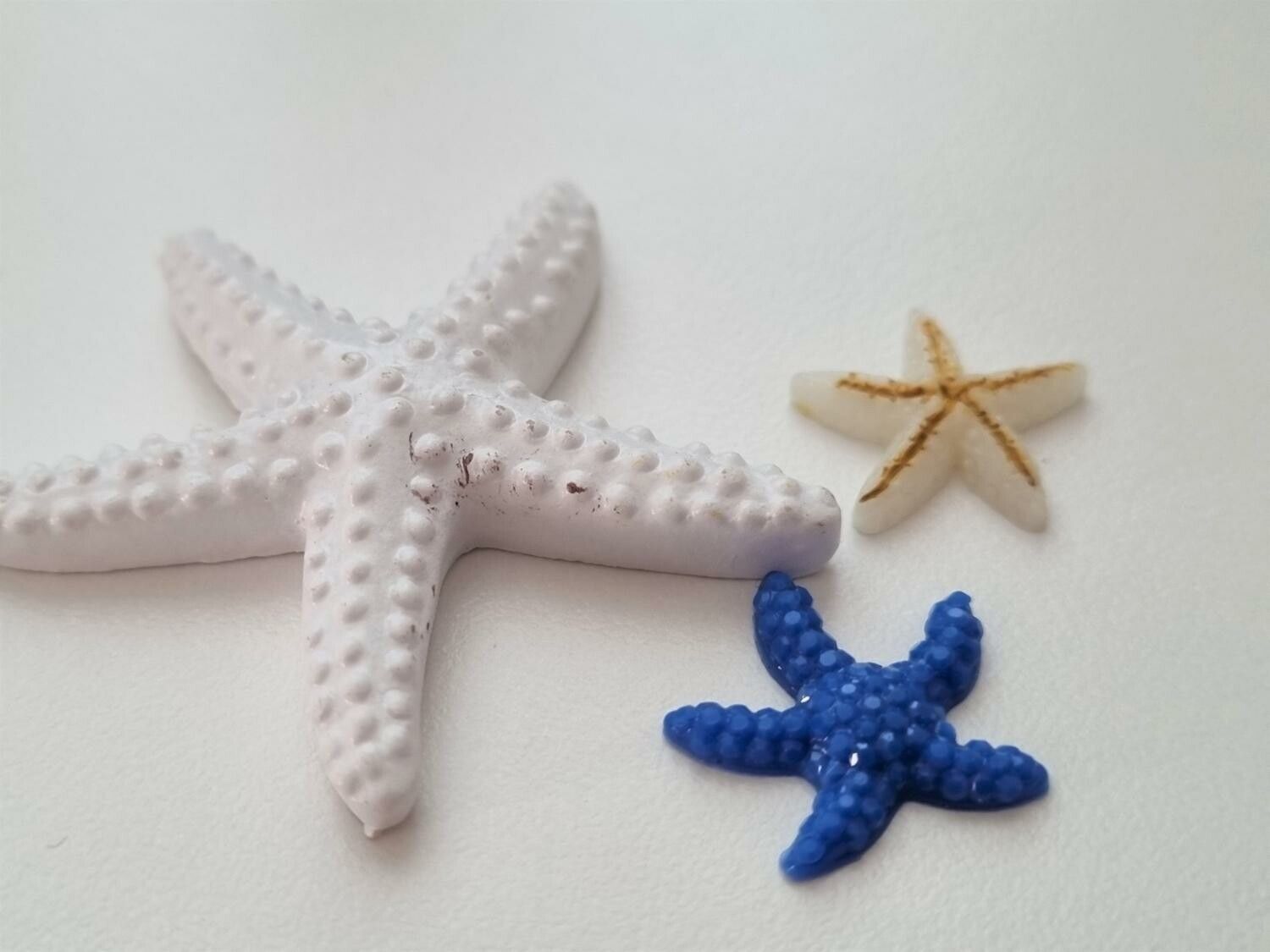 3 st sjöstjärnor. Miniatyrer / figuriner för dockskåpet, tittskåp mm