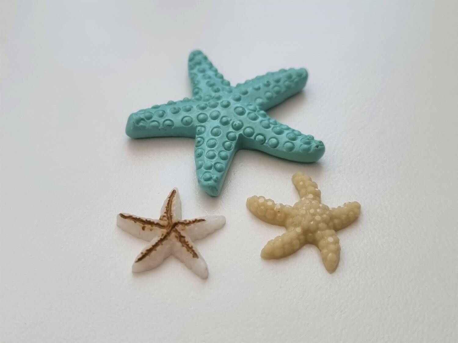 3 st sjöstjärnor. Miniatyrer / figuriner för dockskåpet, tittskåp mm