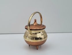 Miniatyrbytta, minibytta med lock