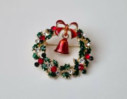 Brosch julkrans. Julkransbrosch med bjällra