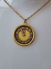 Halsband med klockberlock i steampunk (50 cm långt halsband)
