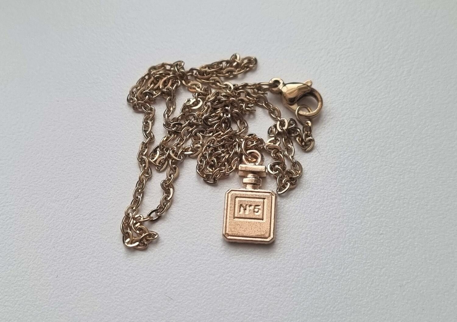 Halsband med parfymflaska (45 cm lång kedja)