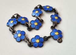 Armband, små blå/gula blommor